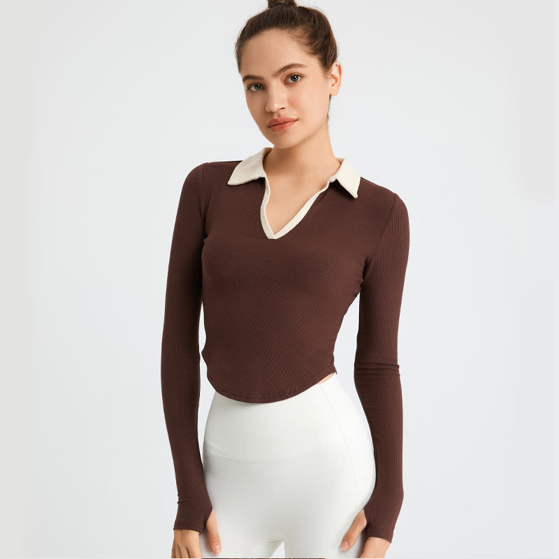 49. Collared, color-blocked V-neck, fitted long-sleeved, rounded hem, stretchy yoga top