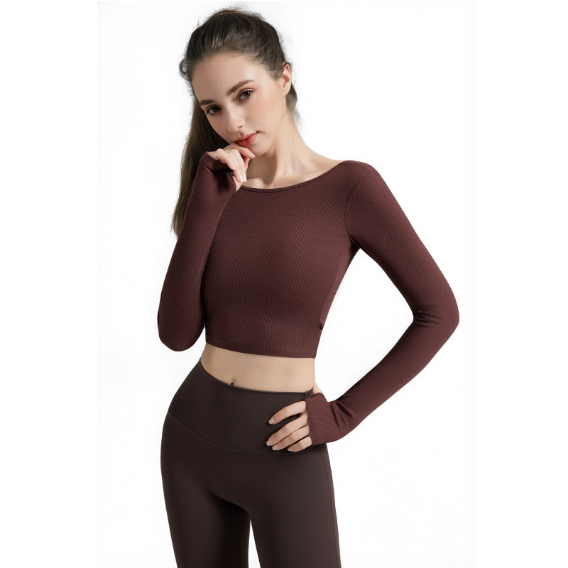72. New women's long-sleeved Pilates training suit with chest pad and hollow-out back, slimming yoga outfit