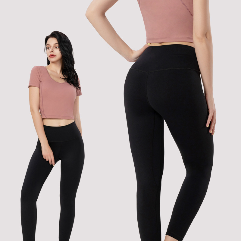 98. Peach-shaped, shapely, tight-fitting yoga pants for women with a peach-like buttocks.