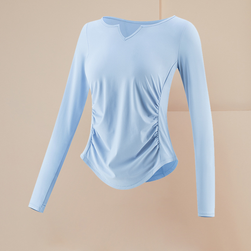 243. Loose and breathable yoga T-shirt/cover-up with V-neck and long sleeves.